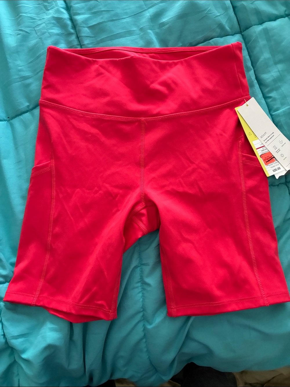 all in motion Women's High-Rise Bike Shorts in Cherry Red